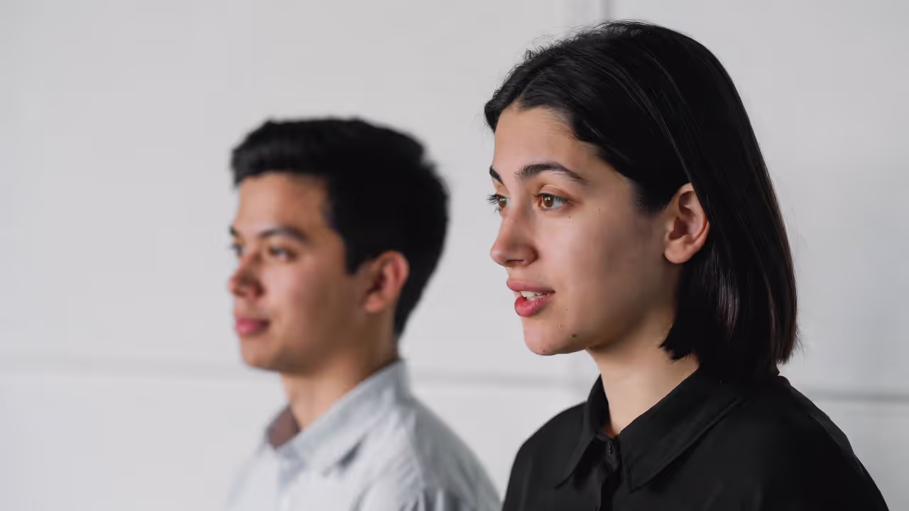 Partner setting a boundary calmly while the other listens